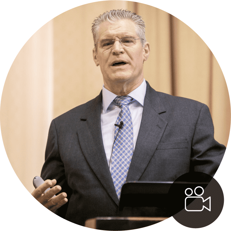 Dr. Carl at a speaking event